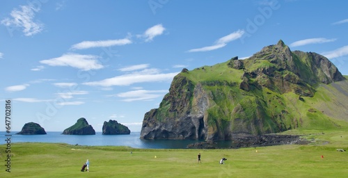 Canvastavla Green golf course next to the elephant rock in Westman Islands, Iceland