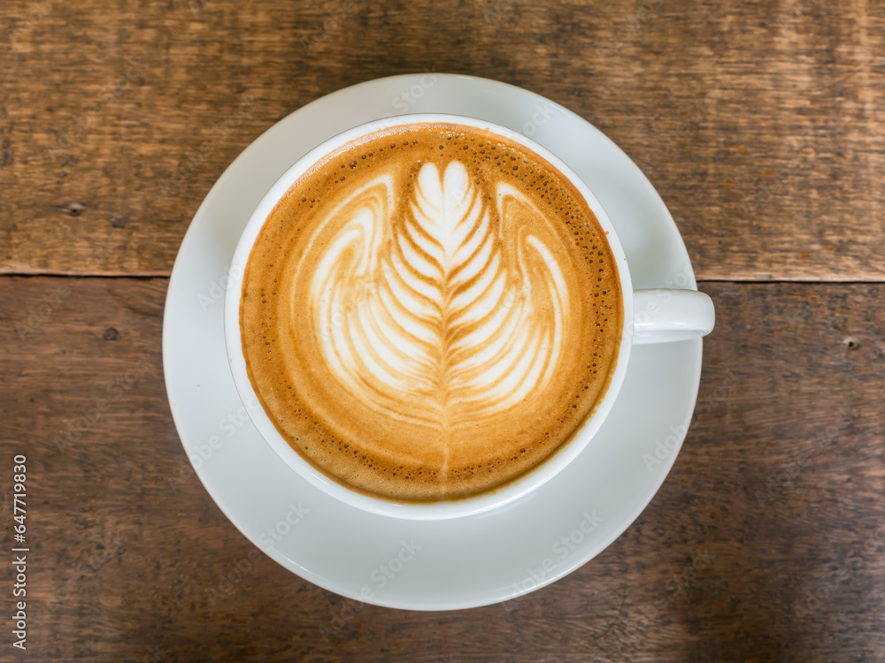 top view latte art rosetta in a white cup top view latte art rosetta in a white cup