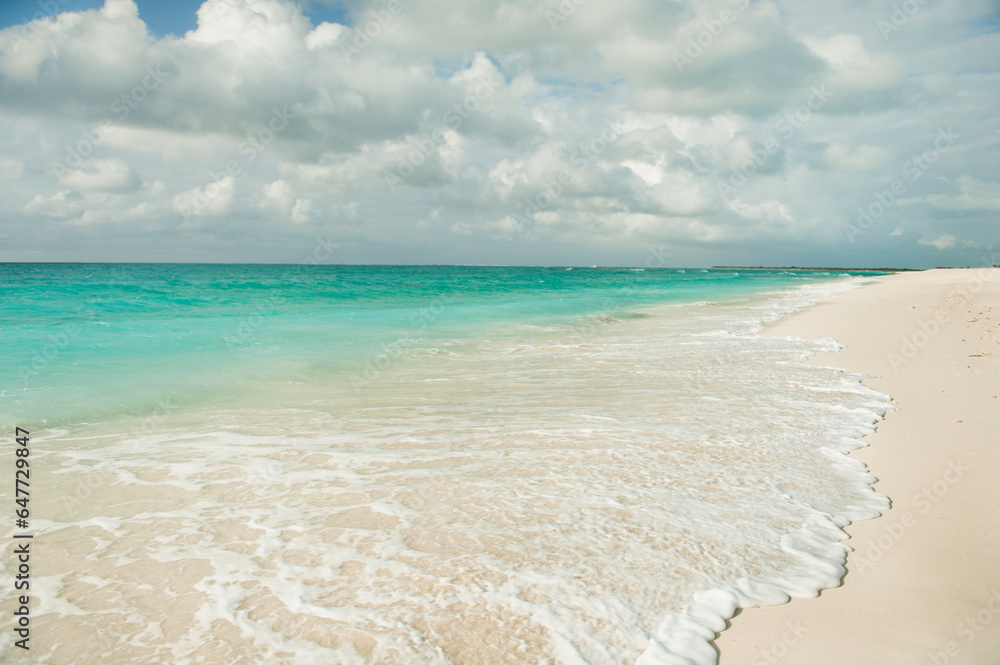 Water Washing Up Onto The Sandy Beach; Providenciales Turks And Caicos Islands Water Washing Up Onto The Sandy Beach; Providenciales Turks And Caicos Islands
