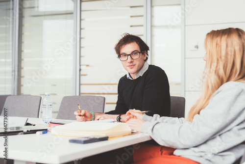 Wallpaper Mural young beautiful serene contemporary business man looking camera Torontodigital.ca