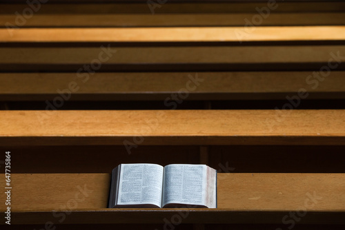 A bible open on a wooden bench; Northumberland england
