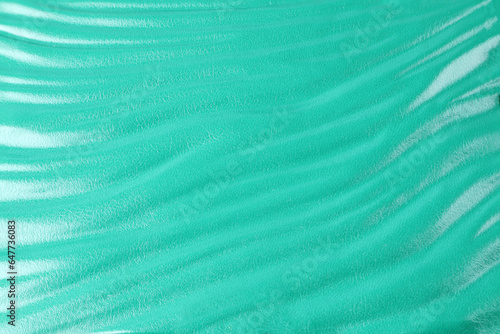 background of green color leather texture of gift box with wave pattern texture design