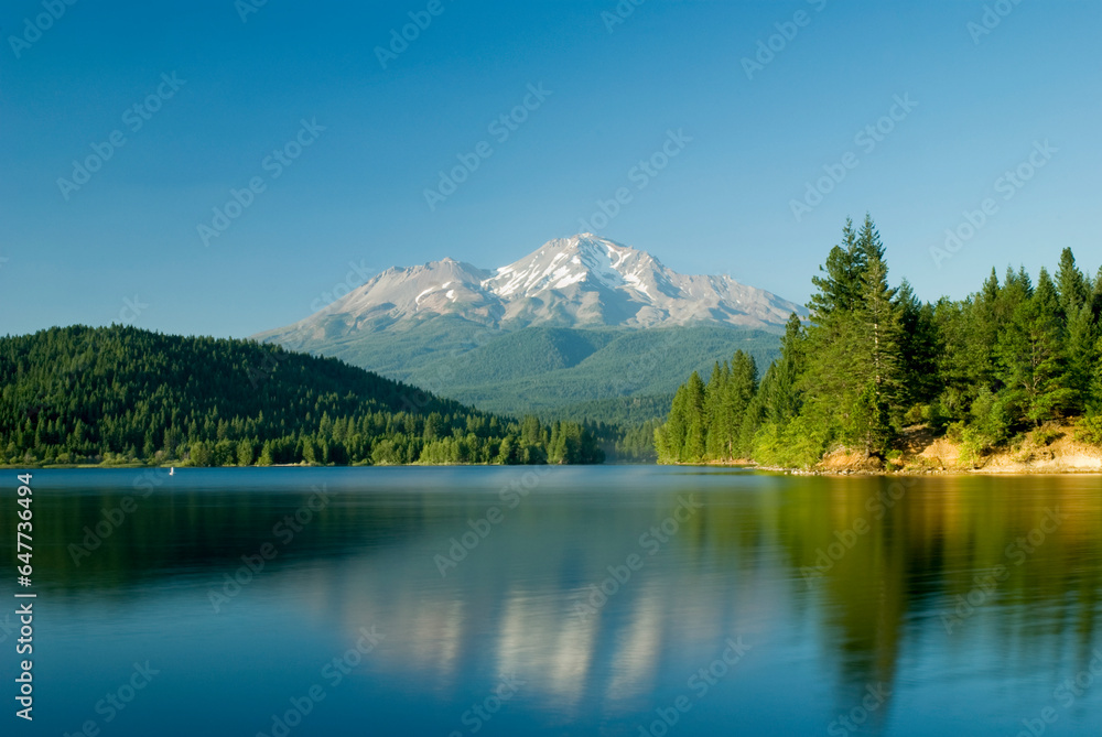 Mount shasta reflected in a tranquil lake; California united states of america Mount shasta reflected in a tranquil lake; California united states of america