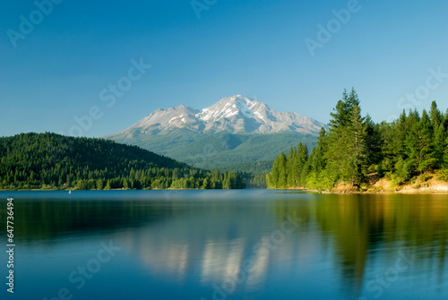 Mount shasta reflected in a tranquil lake; California united states of america photo