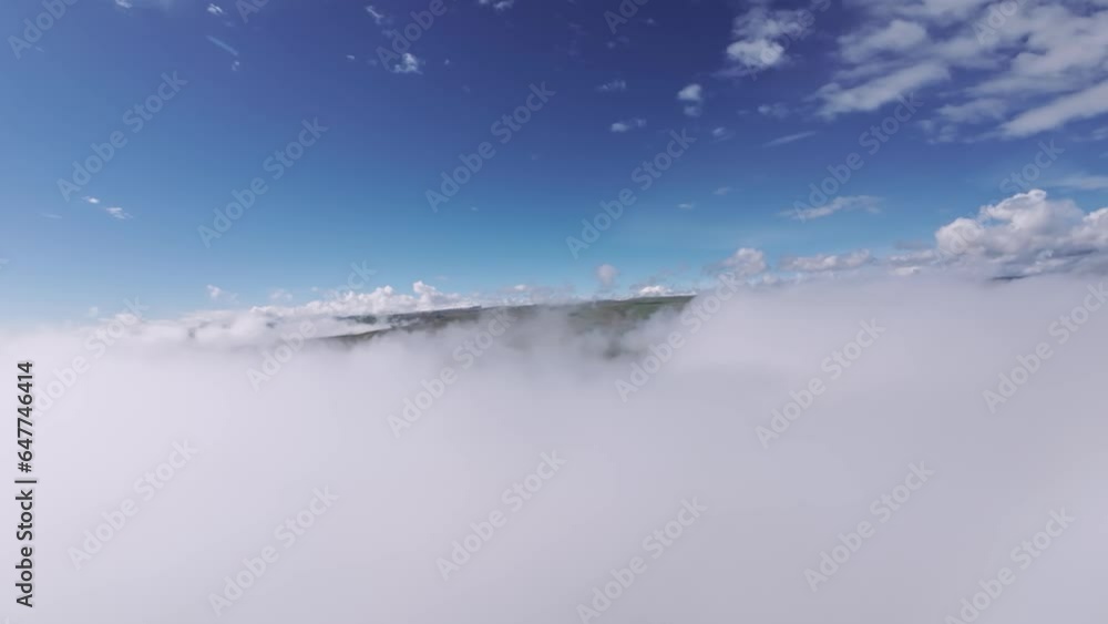 Real flight in the clouds first-person view from the cockpit. Cloud surfing in sunny weather. Aerial view flying through the clouds Real flight in the clouds first-person view from the cockpit. Cloud surfing in sunny weather. Aerial view flying through the clouds