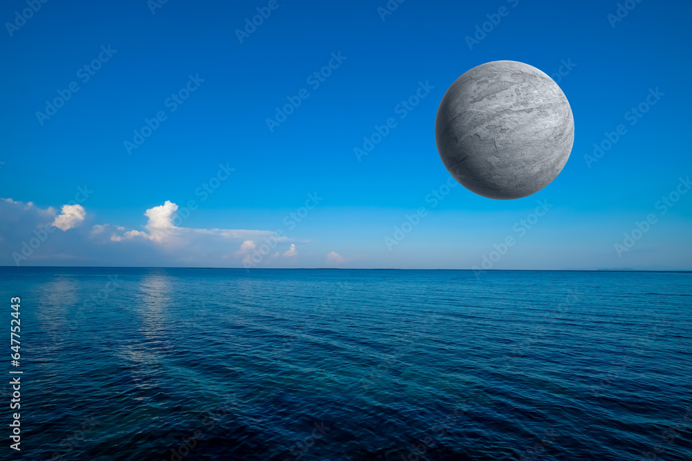 Full moon and sea with blue sky for background