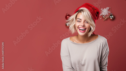 Blonde woman smile in santa claus red hat  Christmas background design