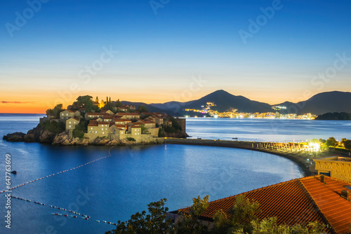 Sveti Stefan island in Montenegro  sunset on the seacoast. Popular travel destination