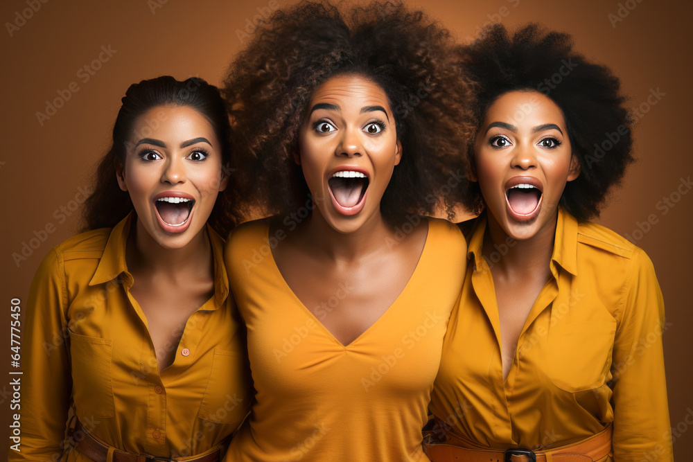 Fototapeta premium Funny portrait of three shocked women looking at camera keeping mouth open. Sudden incredible news reaction wow.