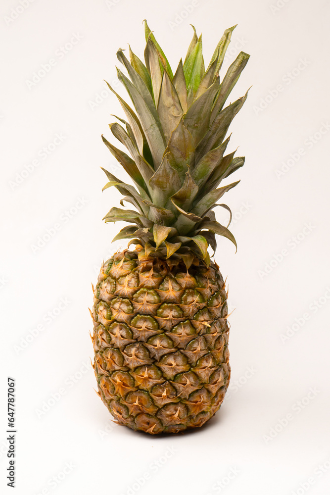 Fototapeta premium Pineapple isolated on white. Top view.