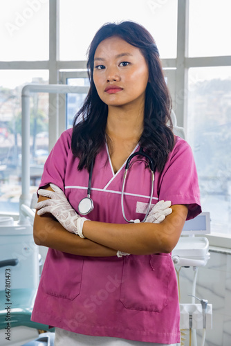 Free Download Confident Beautiful Indian Looking Nepali Dentist Doctor Girl Smiling and Giving gestures - GFXLoad