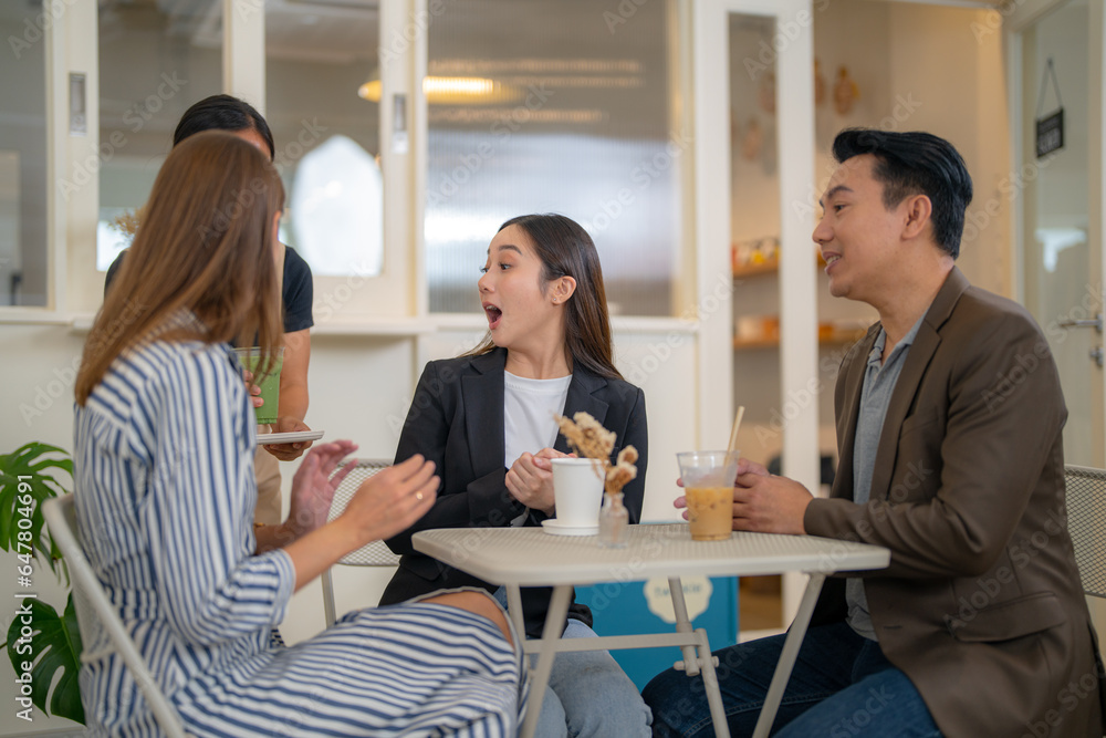Group Business People Chatting Balcony Concept. Business people talking during coffee break. A cheerful friendly group of multicultural colleagues is sitting at the office and having coffee break. Group Business People Chatting Balcony Concept. Business people talking during coffee break. A cheerful friendly group of multicultural colleagues is sitting at the office and having coffee break.