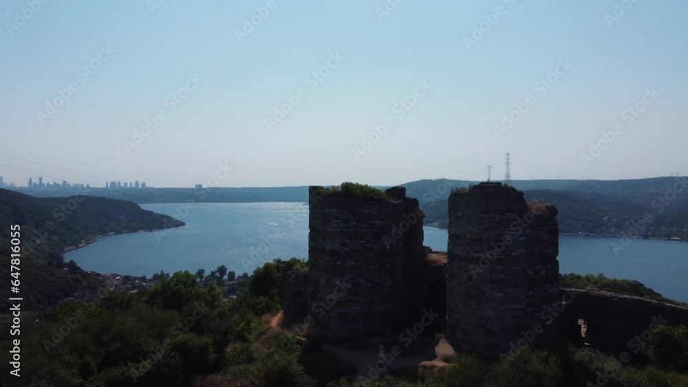 Bosphorus view and a castle from the Eastern Roman period. The bastions of the entrance gate of the castle are still standing. Istanbul is located on the Asian side of the Bosphorus. Bosphorus view and a castle from the Eastern Roman period. The bastions of the entrance gate of the castle are still standing. Istanbul is located on the Asian side of the Bosphorus.