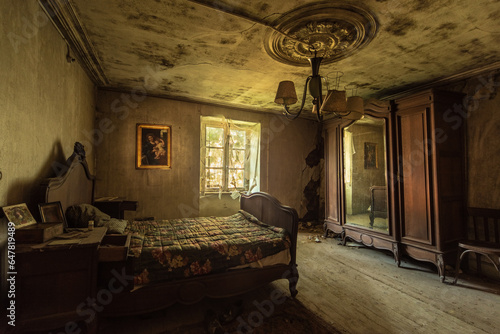 19th 20th century sleeping room in an abandoned house in original state photo