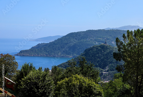 Panoramic view of San Sebastian city surrounded by mountains from Monte Urgull viewpoint