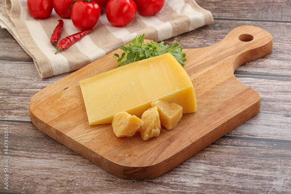 Parmesan hard cheese with small pieces Parmesan hard cheese with small pieces