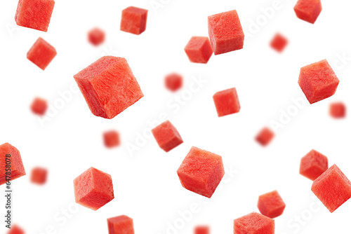 Falling Watermelon cubes isolated on white background, selective focus