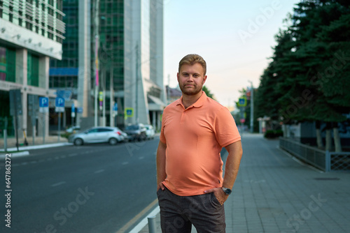 business man walks near a business center