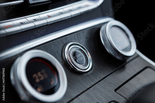 Interior of a modern luxury car with automatic climate control © AvokadoStudio