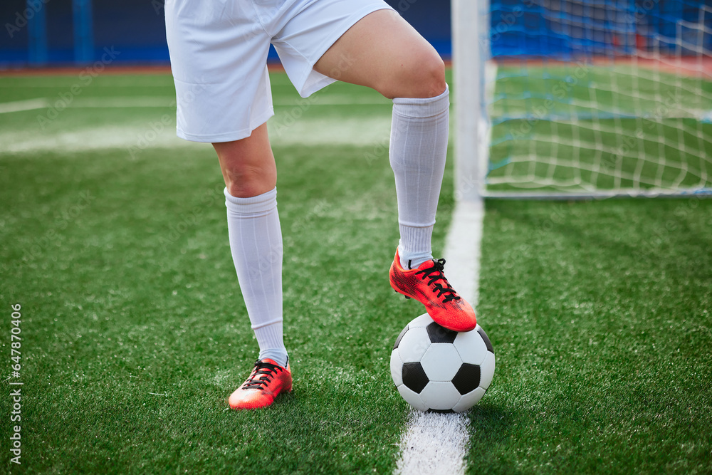 sports girl football player with a soccer ball on the soccer field, the concept of professional women's football sports girl football player with a soccer ball on the soccer field, the concept of professional women's football