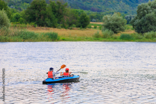 People travel along the river in a kayak. Rafting as a healthy lifestyle. Background
