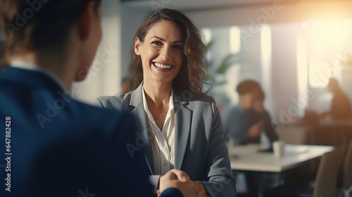 portrait of a smiling businesswoman meaning in office photo