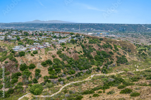 Aerial view of house in Serra Mesa City in San Diego, California, USA. Green Dry Valley and Villas © Unwind