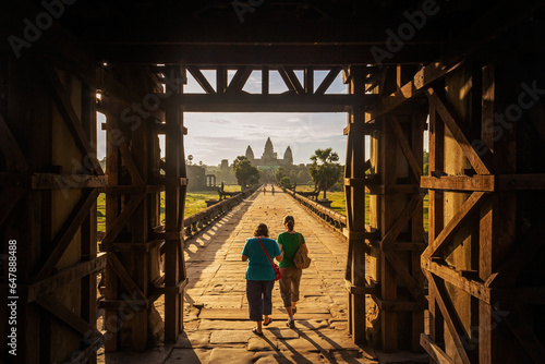  Tourists entrance going into Angkor wat temple in the morning 