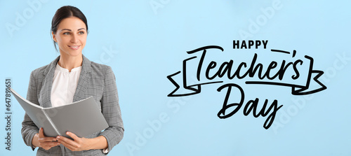 Female teacher with noteboo...