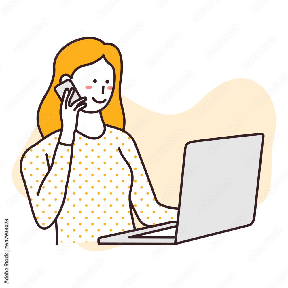 Businesswoman working in front of a laptop while calling Businesswoman working in front of a laptop while calling