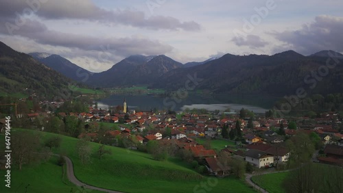 View of mountains and mountain lake in summer. Beautiful town of Schliersee in Bavaria, Germany, Europe. Lake Schliersee in bavarian mountain range. Upper Bayern. Panarama auf den Schliersee.  photo