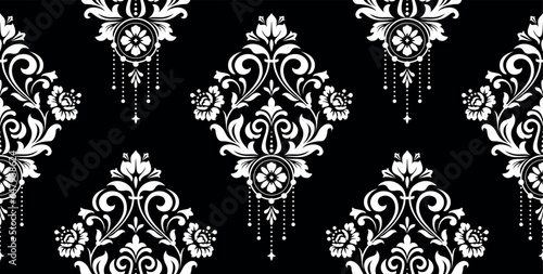 Wallpaper in the style of Baroque. Seamless vector background. White and black floral ornament. Graphic pattern for fabric, wallpaper, packaging. Ornate Damask flower ornament