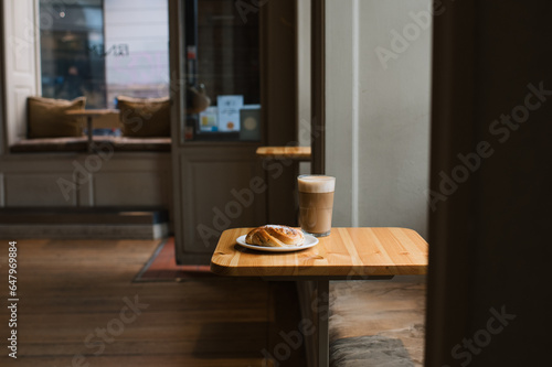Photography coffee and pastry on a table in a cafe