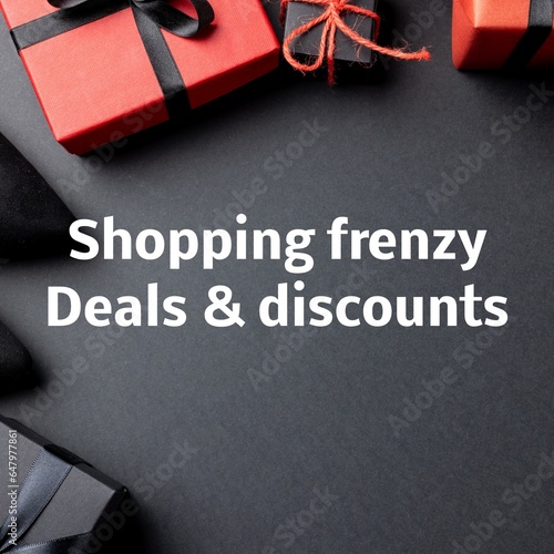 Shopping frenzy, deals and discounts text over red and black gift boxes with bows on black