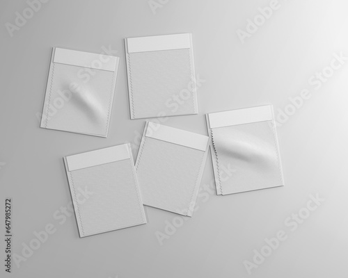 White plain blank empty squarish sample fabric swatches with naming paper jacket on isolated background  photo