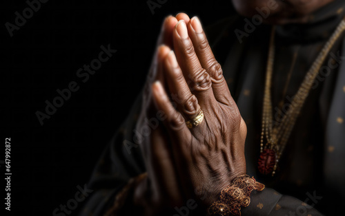 Close up of praying hands. Senior person hands folded in prayer. Religion concept.