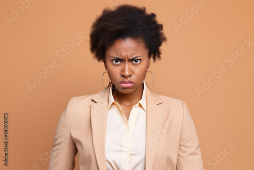 A Woman In A Suit With A Surprised Look On Her Face photo