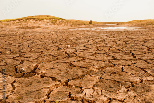 Drought.Dry and cracked land,Dry due to lack of rain.Effects of climate change such as desertification and droughts.