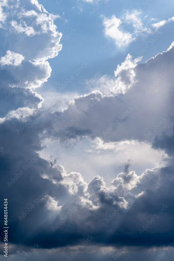 Obraz premium Dramatic sky with grey clouds over the city before the storm. Weather before or after a storm.