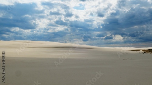 Timelapse of Sandy Desert and Dark Storm Clouds