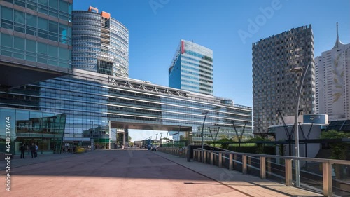 Vienna Donaustadt Danube City timelapse hyperlapse is a modern quarter with skyscrapers and business centres in Vienna, Austria. Modern towers and architecture in vienna city austria