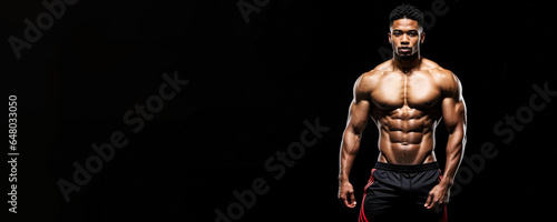 African american male fitness model, trainer isolated on black background with a place for text