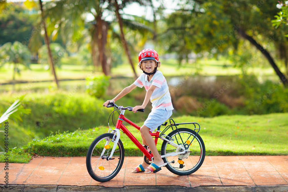 Kids on bike. Child on bicycle. Kid cycling.