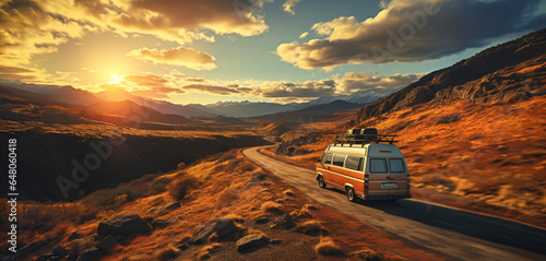 A van traveling at sunset in nature on a canyon path for a road trip to adventure and freedom