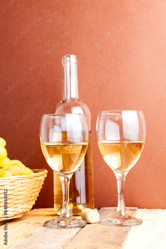 Vertical still life of white wine and grapes Vertical still life of white wine and grapes