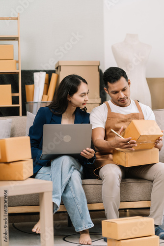Shipping shopping online ,couple start up small business owner, small business entrepreneur SME or freelance asian couple working with box at home.