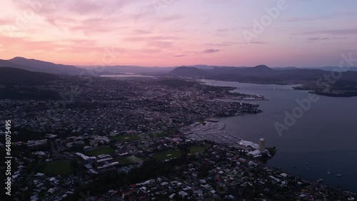 Hobart, Australia: Aerial drone footage of a cinematic sunset over the Hobart city in Tasmania main city in Australia.  photo