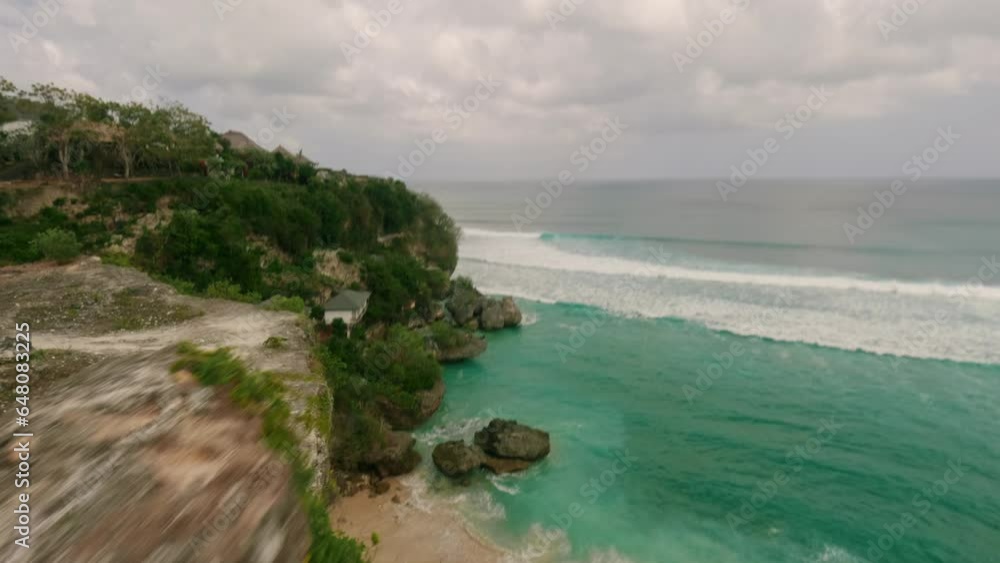 Aerial view of the coast of the sea in Bali (Indonesia). FPV drone travel video Aerial view of the coast of the sea in Bali (Indonesia). FPV drone travel video