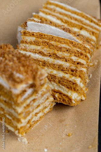 multi-layer cake with sponge cake with honey and buttercream