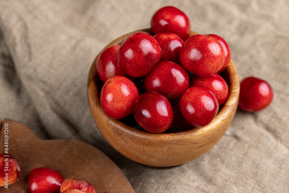 red cherries on the table during cooking red cherries on the table during cooking